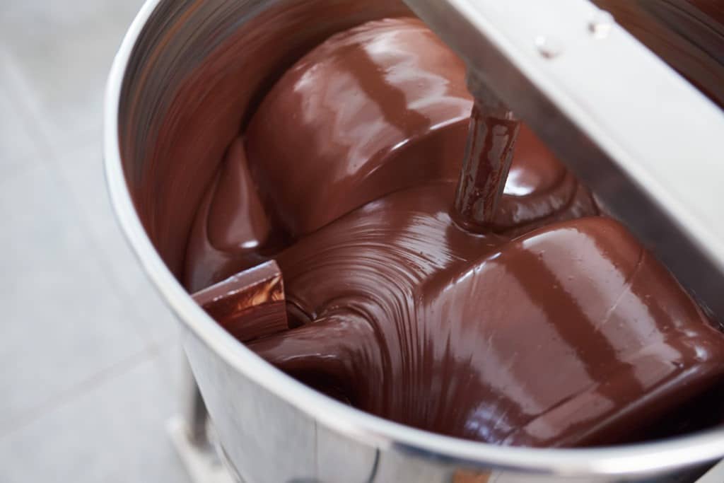 Chocolate being mixed at a factory.