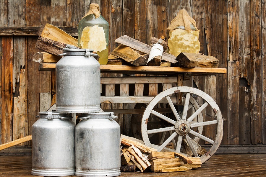 Aluminum flasks with horse cart.