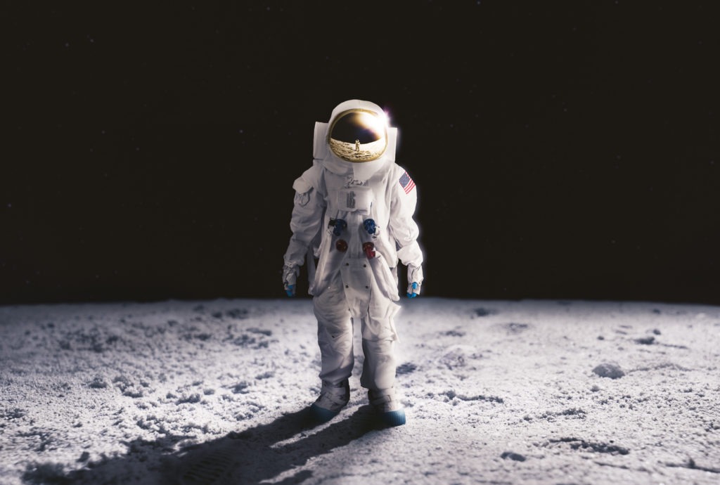 Lone astronaut walking on the moon.