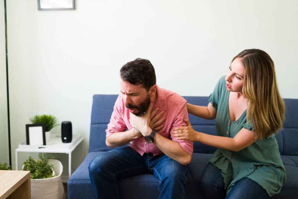 Man suffocating and having trouble breathing.