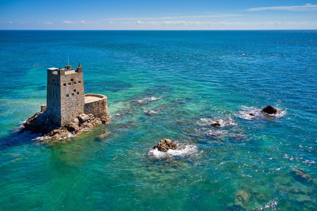 Aerial drone image of Seymour Tower at high tide in the sunshine.